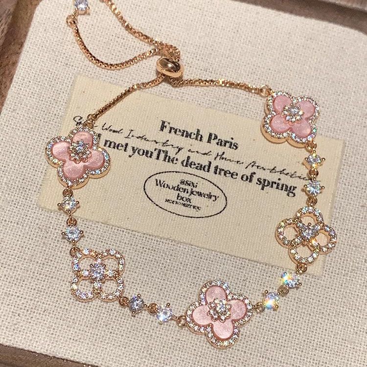 Adjustable Rose Gold Clover Bracelet with Sparkling Floral