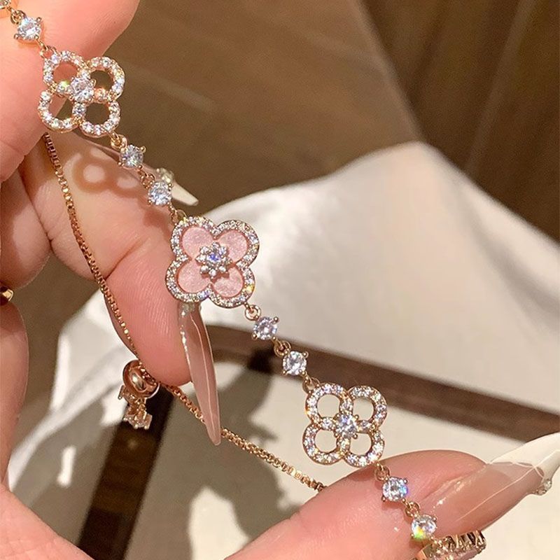 Adjustable Rose Gold Clover Bracelet with Sparkling Floral