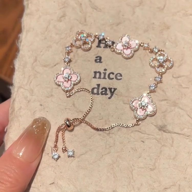 Adjustable Rose Gold Clover Bracelet with Sparkling Floral