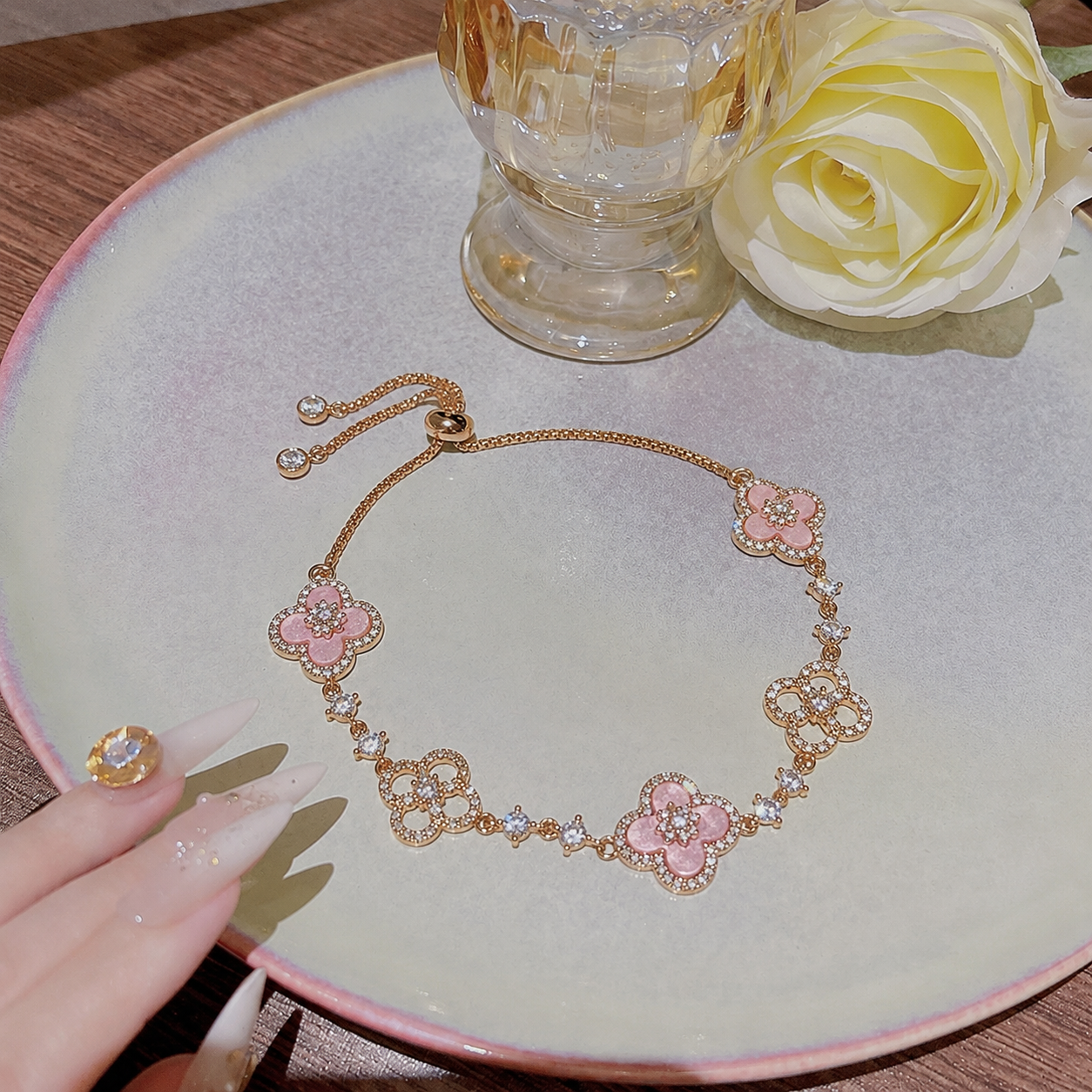 Adjustable Rose Gold Clover Bracelet with Sparkling Floral