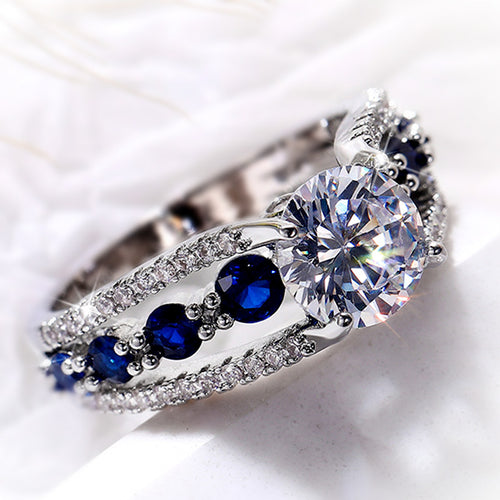 Blue Stone Split Shank Ring with Round Center Zircon