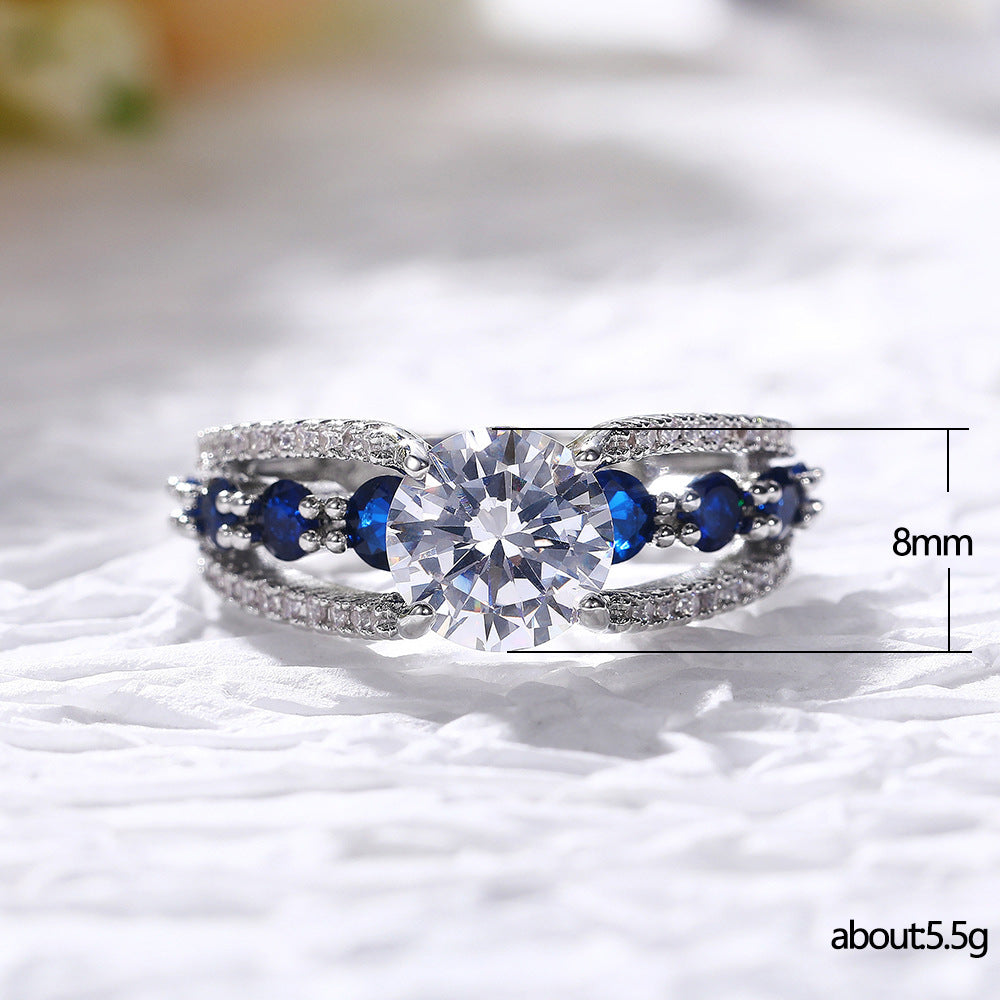 Blue Stone Split Shank Ring with Round Center Zircon
