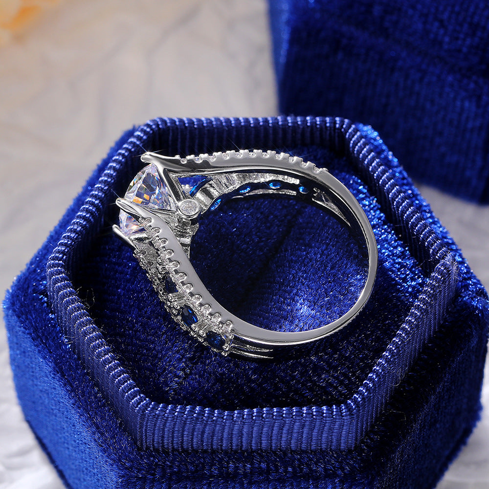 Blue Stone Split Shank Ring with Round Center Zircon